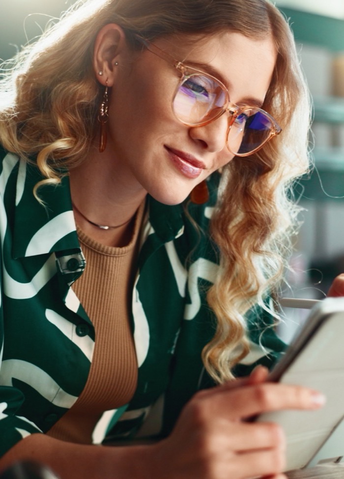 Consultant reviewing work on a tablet