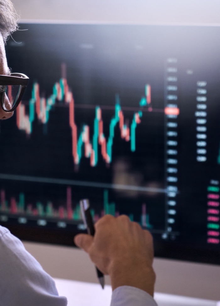 Trader watching a cryptocurrency price chart